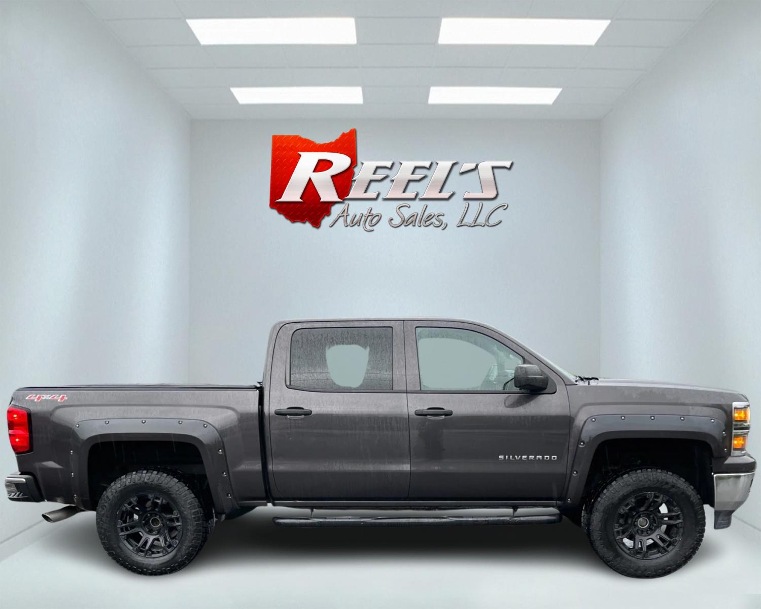 2014 Gray /Black Chevrolet Silverado 1500 LT Crew Cab 4WD (3GCUKREC7EG) with an 5.3L V8 OHV 16V engine, 6-Speed Automatic transmission, located at 11115 Chardon Rd. , Chardon, OH, 44024, (440) 214-9705, 41.580246, -81.241943 - This 2014 Chevrolet Silverado 1500 LT Crew Cab is a capable and well-equipped pickup truck. It's powered by a 5.3L Vortec V8 engine mated to a 6-speed automatic transmission with 3.42 gearing, delivering a robust 9,100-pound towing capacity. This particular model is lifted and rides on 33-inch all-t - Photo #4